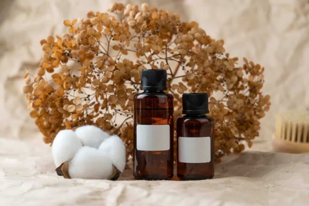 A mockup dropper bottle with face serum with vitamin C or natural oil