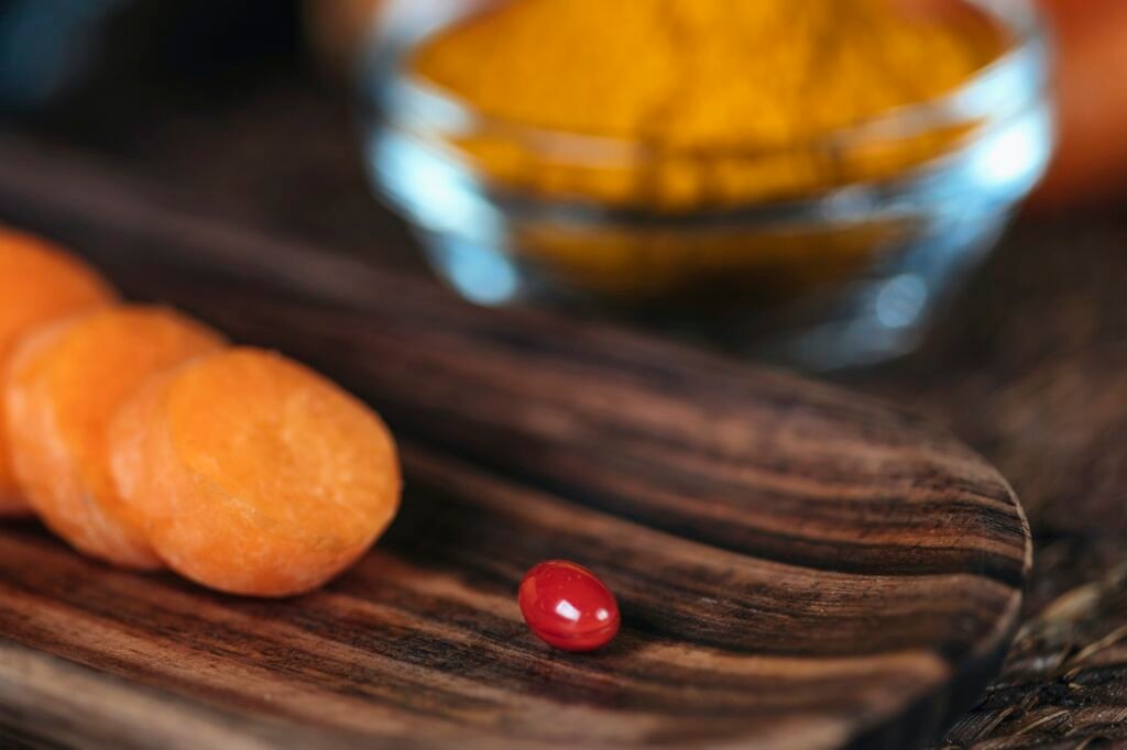 Beta Carotene Supplement Pills and Vegetables