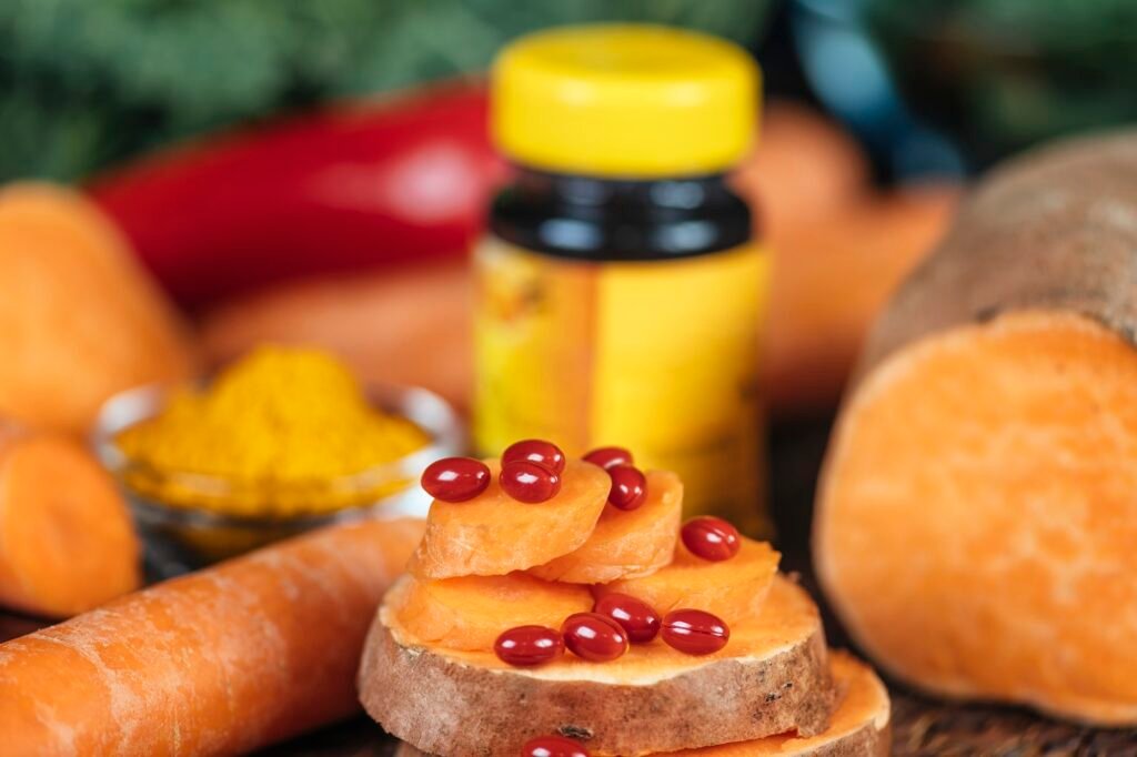 Beta Carotene Supplement Pills and Vegetables