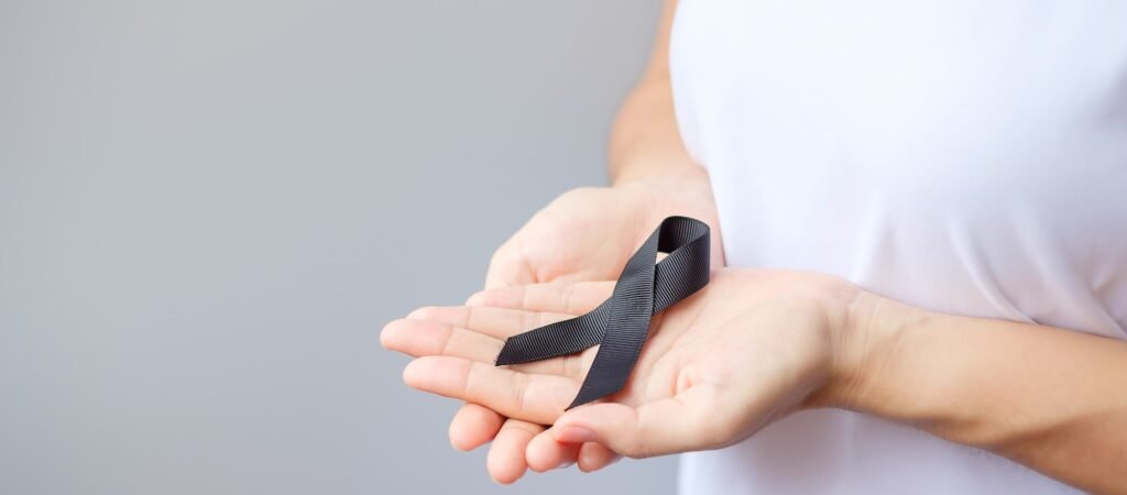 black Ribbon for Melanoma and skin cancer, Vaccine injury awareness month, grief and rest in peace.