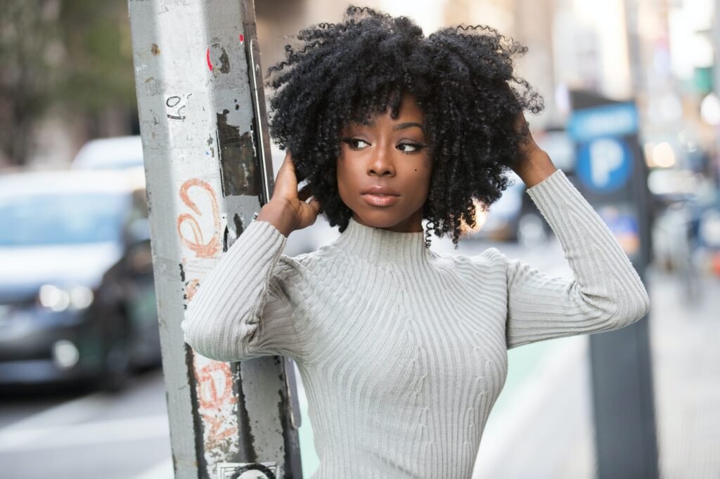 African American woman with black curly hair