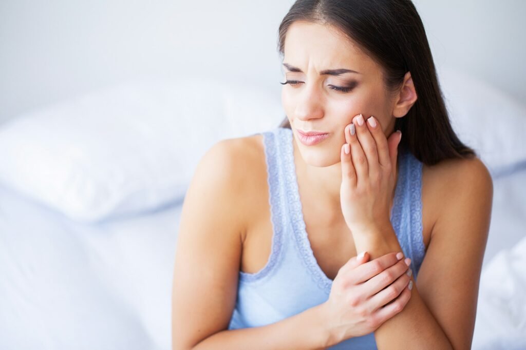 Teeth Problem. Woman Feeling Tooth Pain.